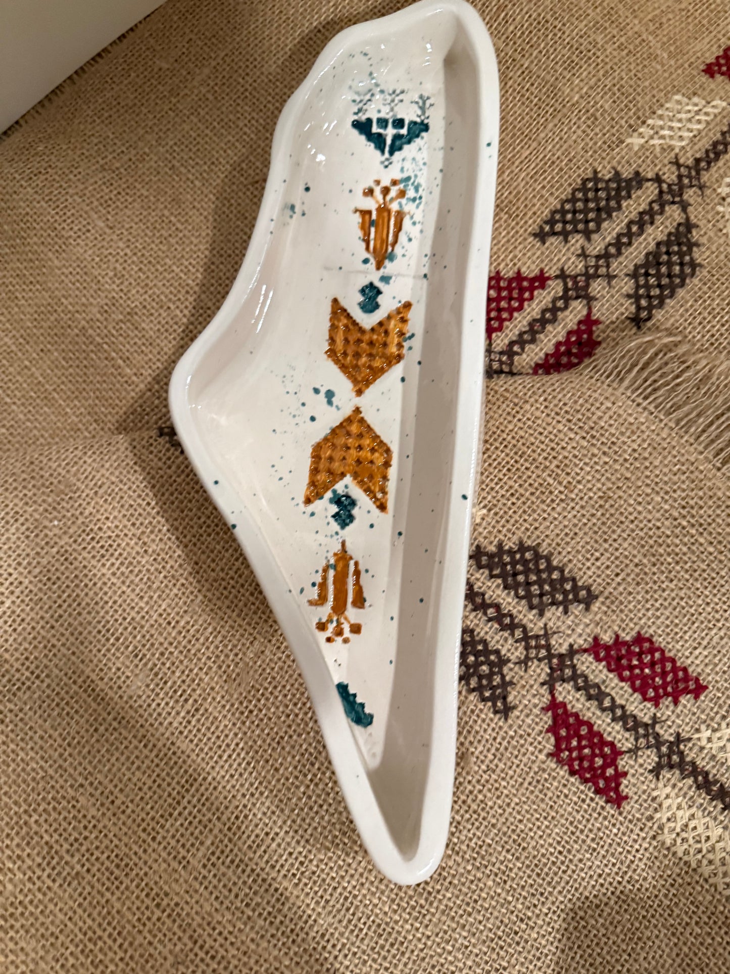 Etched in Clay: Ceramic Palestine Dish Splatter Design